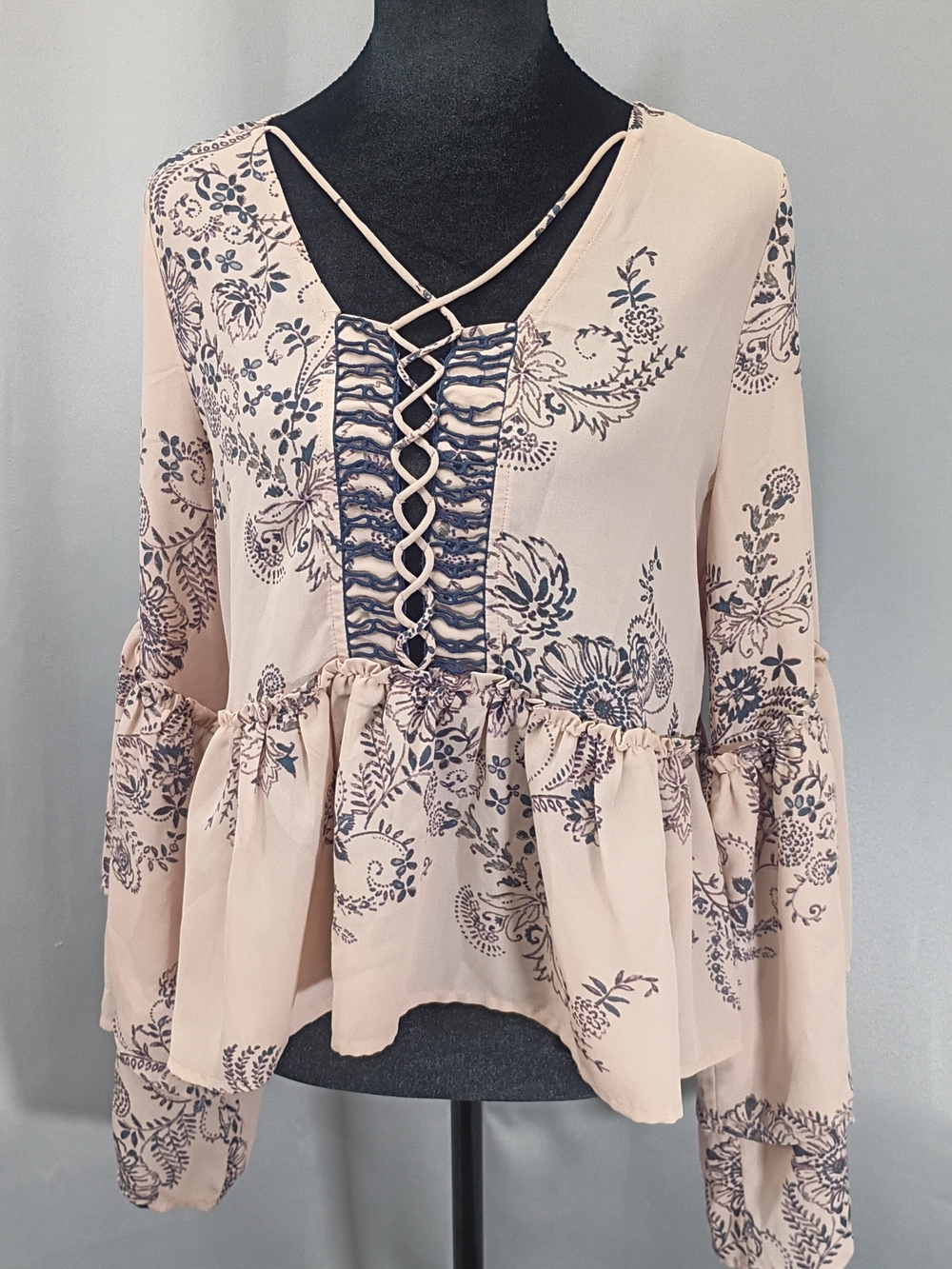 Sun & Shadow Blush Floral Lace-Up Peplum Blouse